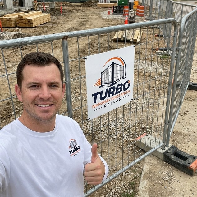 Turbo Temporary Fence Rental Dallas crew installing chain link temporary fencing at a construction site in Dallas